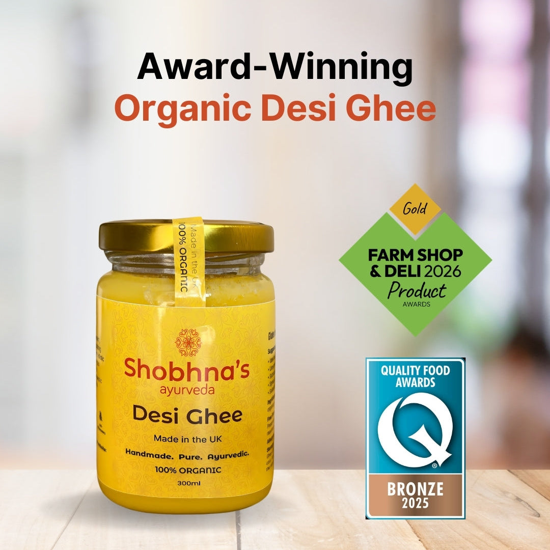 Jar of Shobhna's Desi Ghee with awards on a blurred background
